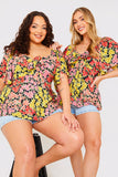 Sustainable Floral Tie Front Flute Sleeve Smock Top