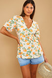 Printed Twist Front Pep Hem Jersey Top