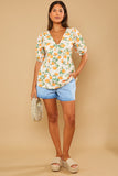 Printed Twist Front Pep Hem Jersey Top
