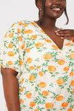 Printed Twist Front Peplum Jersey Top