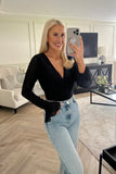 Wrap Front Flared Cuff Bodysuit
